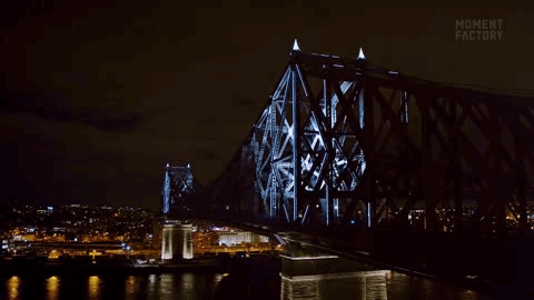 蒙特利尔的雅克·卡迪亚钢骨结构大桥 | 随城市脉搏舞动的大桥彩灯 | 来源：Moment Factory